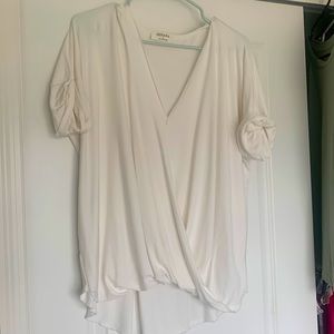 Brand new beautiful cream top.